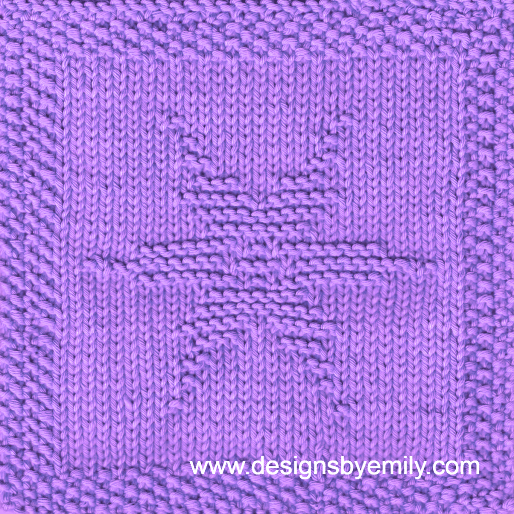 Snowflake Knit Dishcloth: A handmade knitted dishcloth square in purple yarn adorned with a six-pointed snowflake in the center. The design is created using knit and purl stitches.