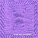Snowflake Knit Dishcloth: A handmade knitted dishcloth square in purple yarn adorned with a six-pointed snowflake in the center. The design is created using knit and purl stitches.