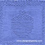 Acorn Knit Dishcloth: A handmade knitted dishcloth square in blue yarn featuring an acorn. The design is created using knit and purl stitches.