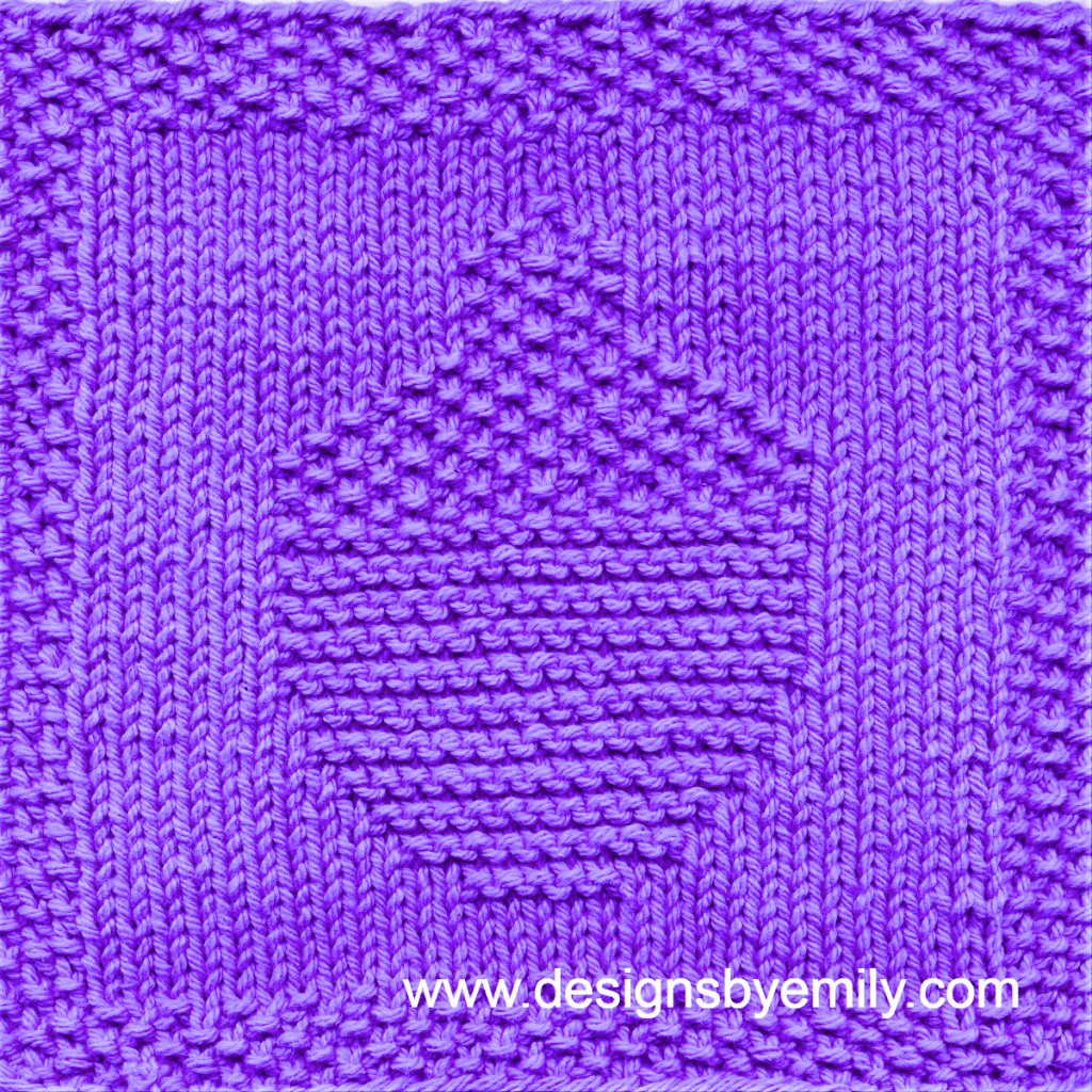 Acorn Knit Dishcloth: A handmade knitted dishcloth square in purple yarn featuring an acorn. The design is created using knit and purl stitches.