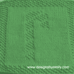 Candy Cane Knit Dishcloth: A handmade knit dishcloth square in green yarn featuring a striped candy cane. The design is created in seed stitch using knits and purls on a stockinette background.
