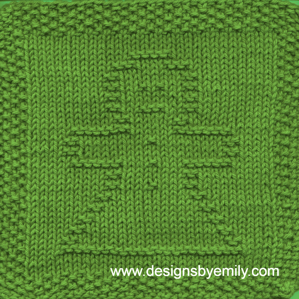 Gingerbread Girl Knit Dishcloth: A cozy knitted dishcloth square in green yarn featuring a cheerful gingerbread girl in the center, perfect for holiday decor. The design is created in garter stitch using knit and purl stitches on a stockinette background.
