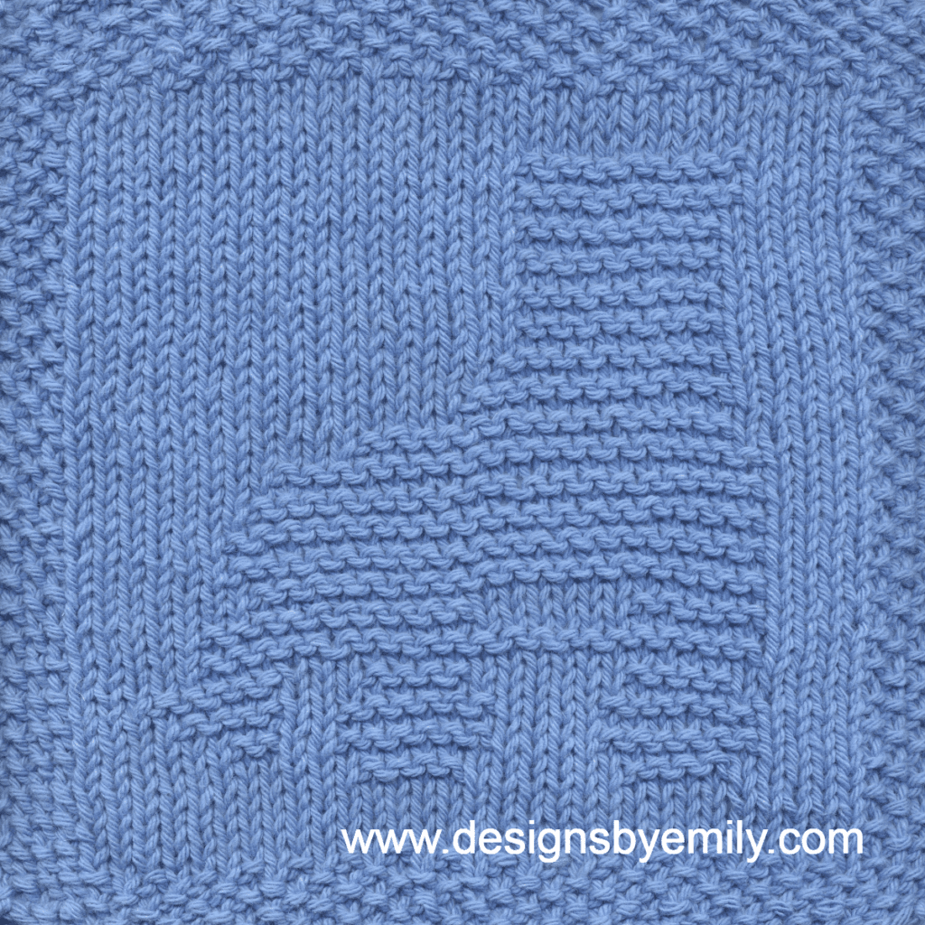 Roller Skate Knit Dishcloth: A handmade knitted square in light blue yarn featuring the profile of a roller skate with stopper, facing left. The design is created in garter stitch using knit and purl stitches on a stockinette background.
