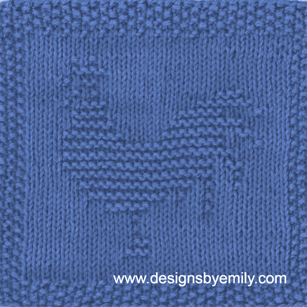 Rooster Knit Dishcloth: A cozy knitted dishcloth square in blue yarn featuring a rooster facing left with a plume of tail feathers. The design is created in garter stitch using knit and purl stitches on a stockinette background.