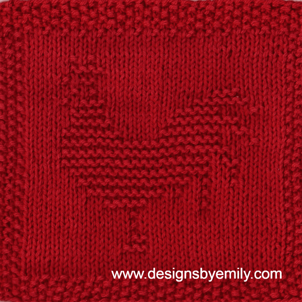 Rooster Knit Dishcloth: A cozy knitted dishcloth square in deep red yarn featuring a rooster facing left with a plume of tail feathers. The design is created in garter stitch using knit and purl stitches on a stockinette background.