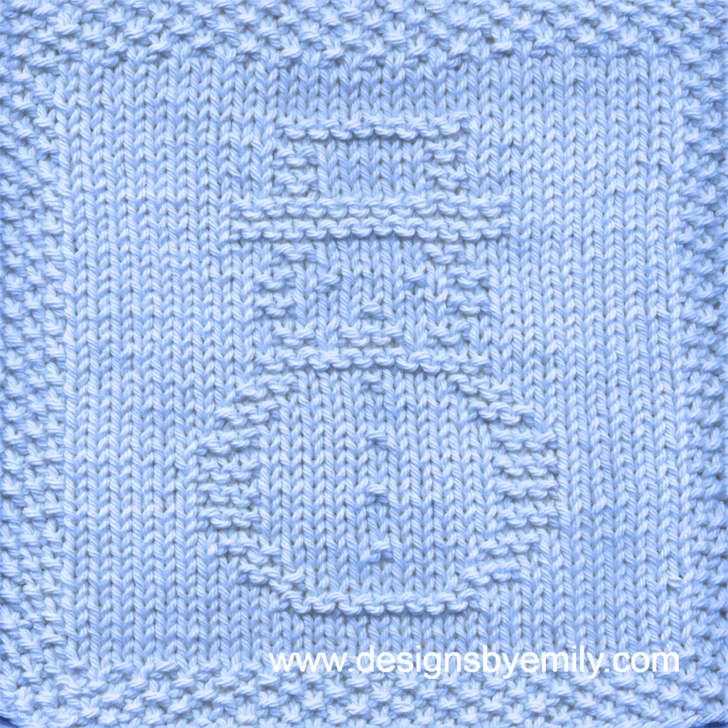 Snowman Knit Dishcloth: A cozy knitted dishcloth square in light blue yarn adorned with a delightful snowman, perfect for celebrating the winter season with warmth and charm. The design is created using simple knit and purl stitches.
