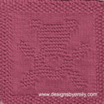 Teddy Bear Love Knit Dishcloth: A handmade knitted dishcloth square in deep pink yarn featuring a cute teddy bear with its arms and legs spread out and a heart on its belly. The design is created in garter stitch using knit and purl stitches on a stockinette background.