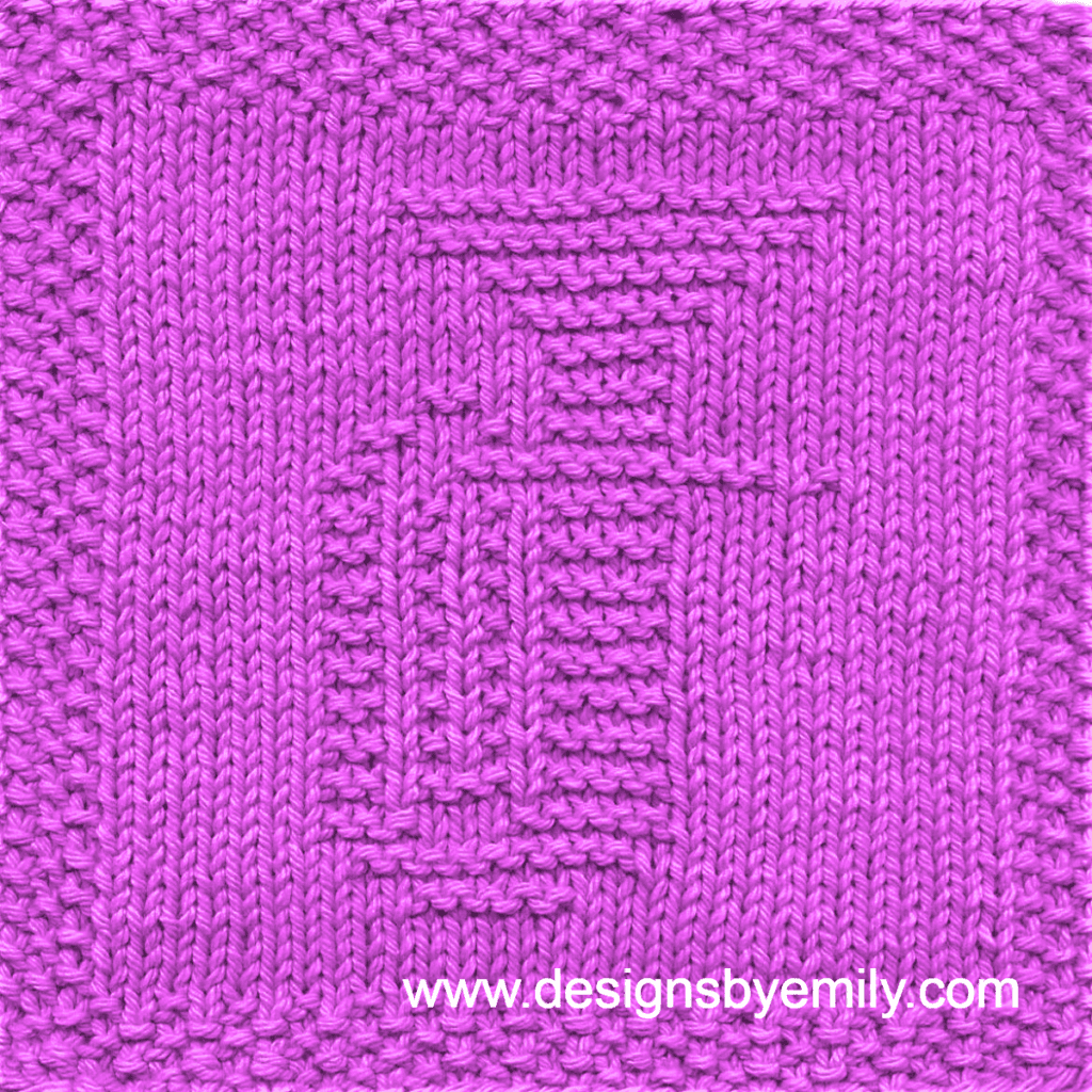 Baritone or Tuba Knit Dishcloth: A handmade knitted dishcloth square in hot pink yarn displaying a tuba or baritone musical instrument. The design is created in garter stitch using knit and purl stitches on a stockinette background.
