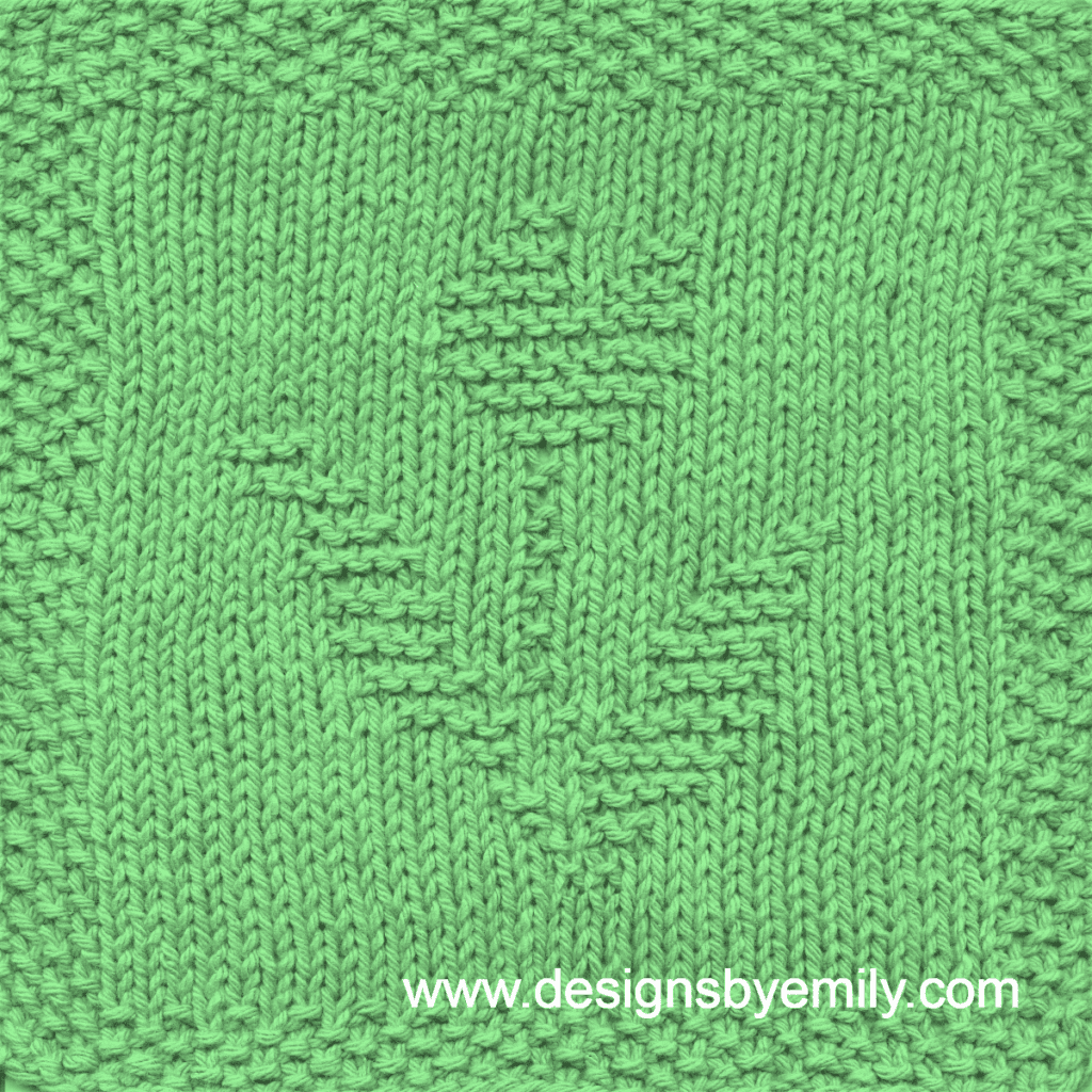 Tulip Knit Dishcloth: A handmade knitted dishcloth square in green yarn displaying a single tulip with its distinctive leaves to each side. The design is created using knit and purl stitches.