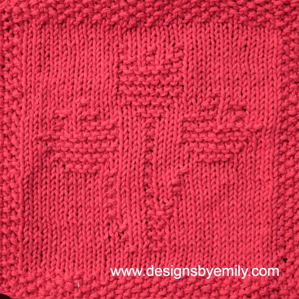 Tulip Trio Knit Dishcloth: A handmade knitted dishcloth square in red yarn displaying three tulips sprouting from the center. The design is created using knit and purl stitches.