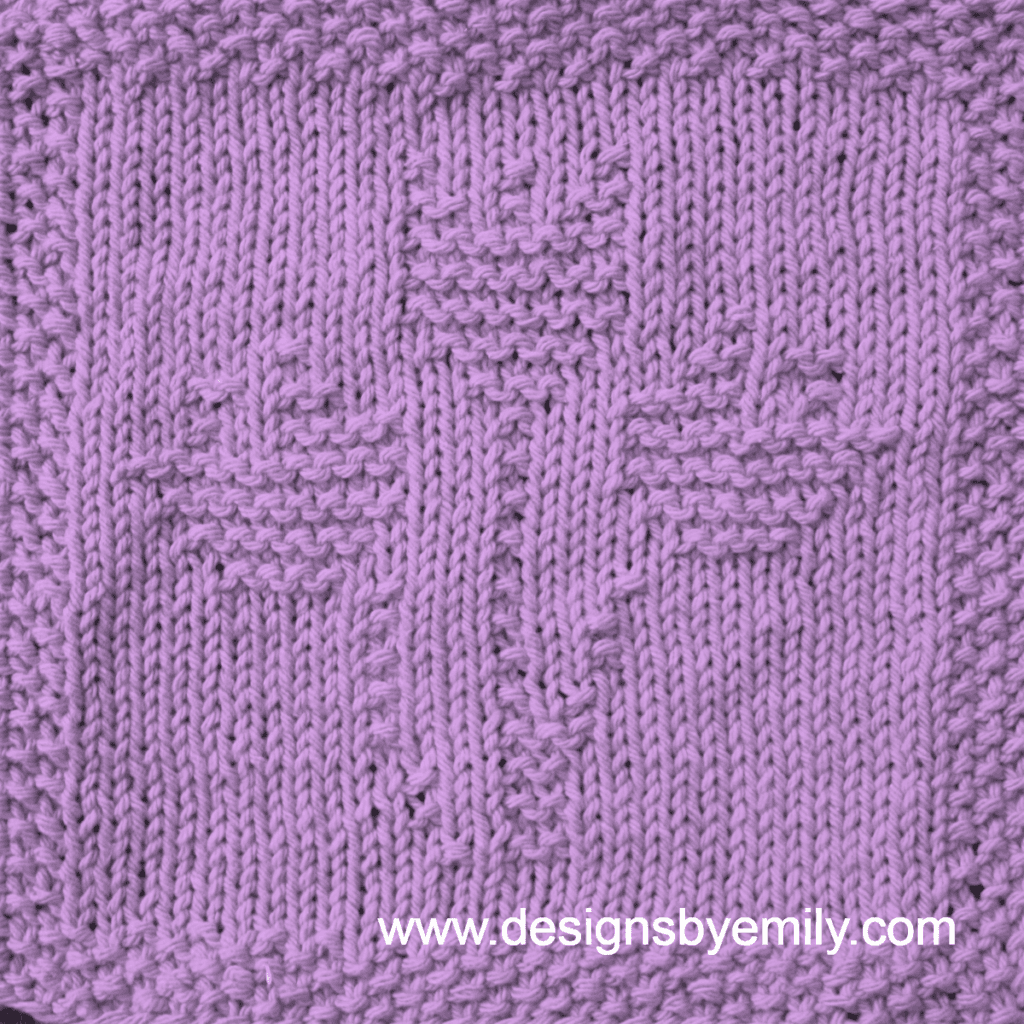 Tulip Trio Knit Dishcloth: A handmade knitted dishcloth square in lilac yarn displaying three tulips sprouting from the center. The design is created using knit and purl stitches.