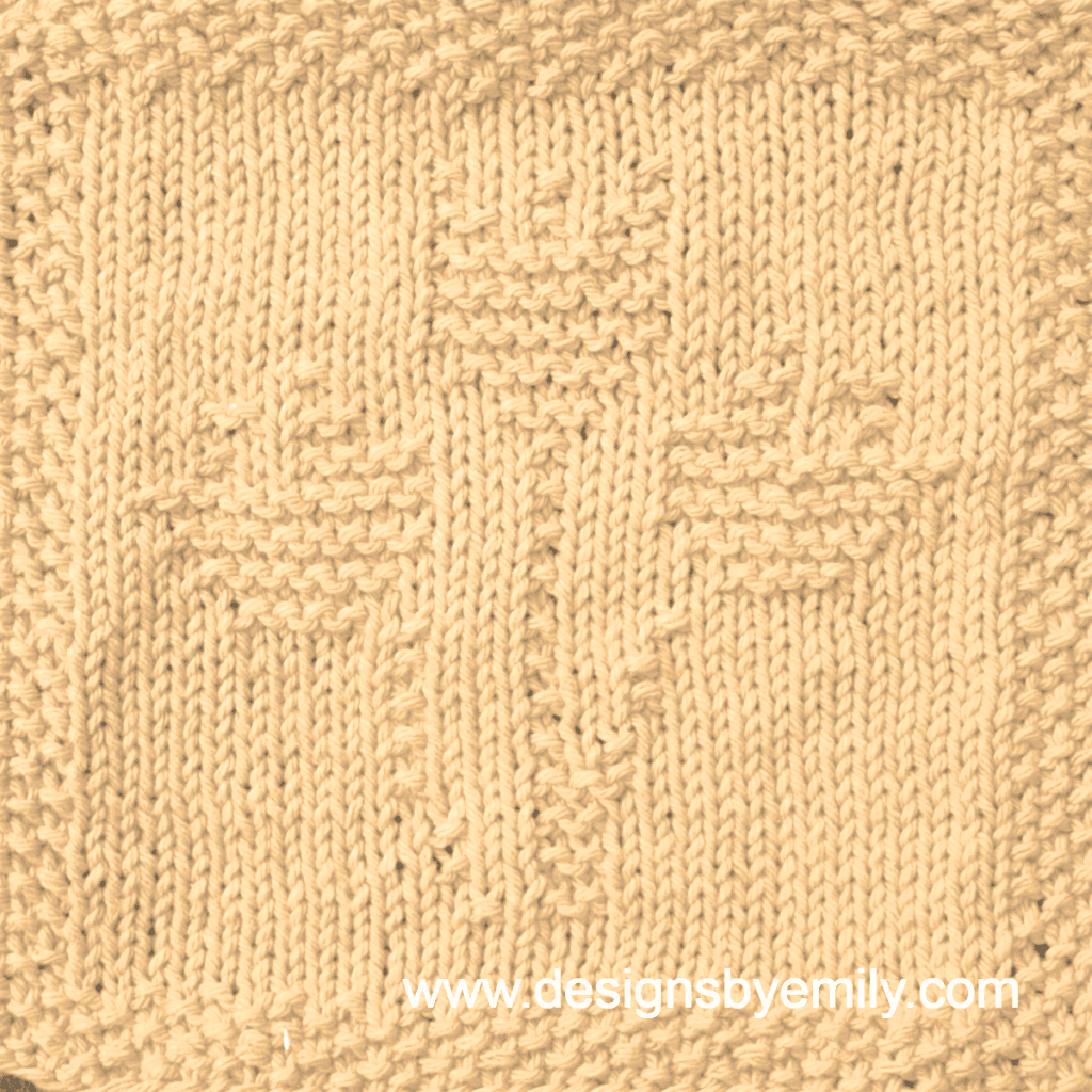 Tulip Trio Knit Dishcloth: A handmade knitted dishcloth square in yellow yarn displaying three tulips sprouting from the center. The design is created using knit and purl stitches.